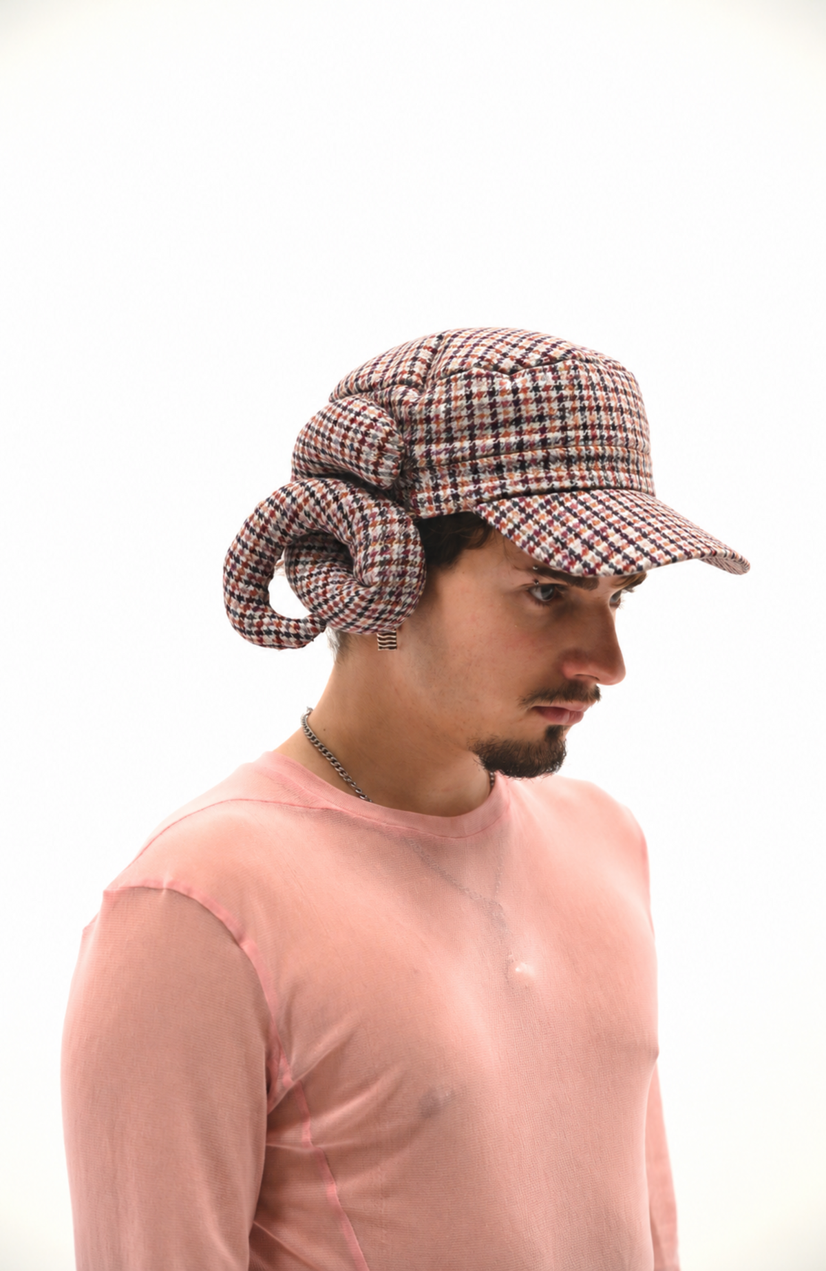 Castaneda horned hat in ivory, burgundy, rust and charcoal houndstooth